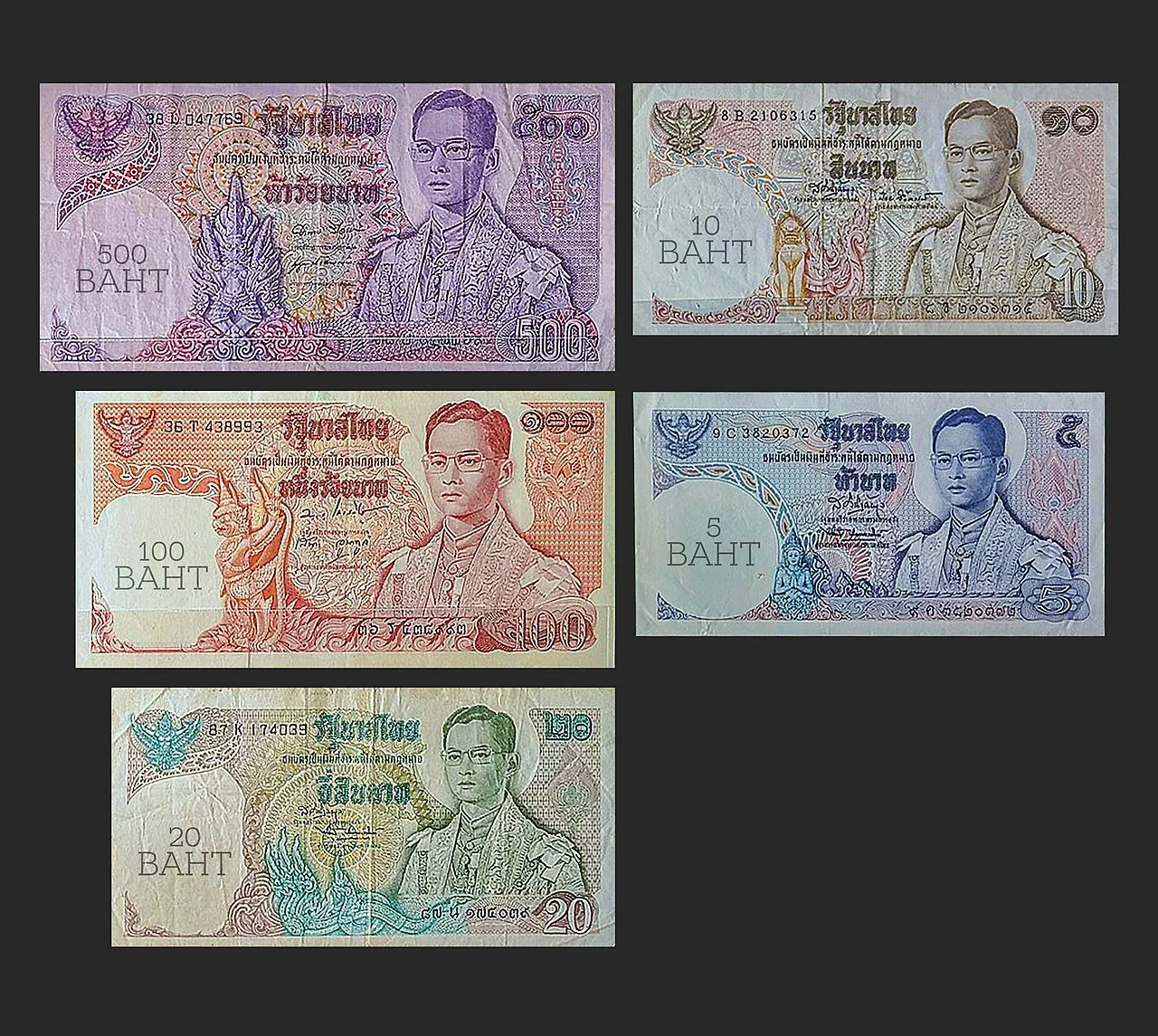 Five older Thai baht banknotes in different colours on a dark background.